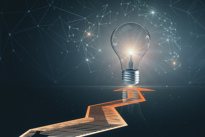 3D rendering of arrow on ground leading to lightbulb