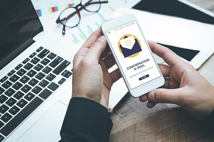 hand holding a phone with application opened