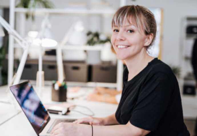 Woman working at a laptop