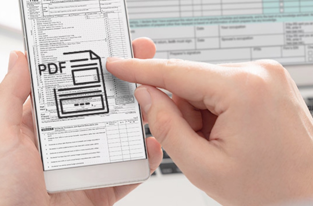 Handy mit einem PDF Symbol auf dem Bildschirm