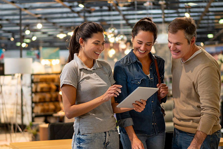 Team of wholesale is working with tablet