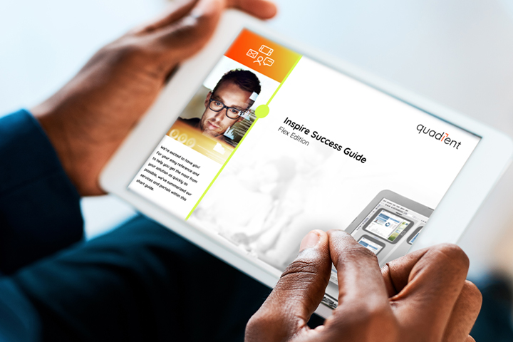 Man viewing Inspire Flex customer success guide on iPad