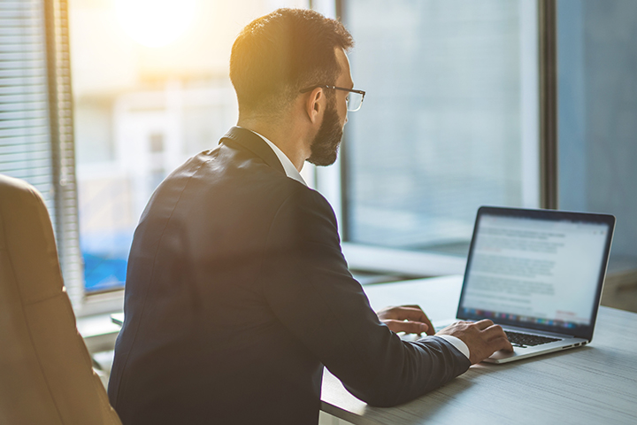 man working on laptop