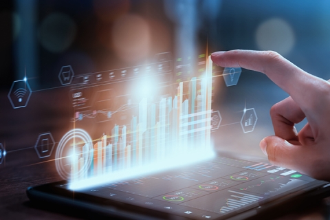 hand touching an animation of graphs and analytics