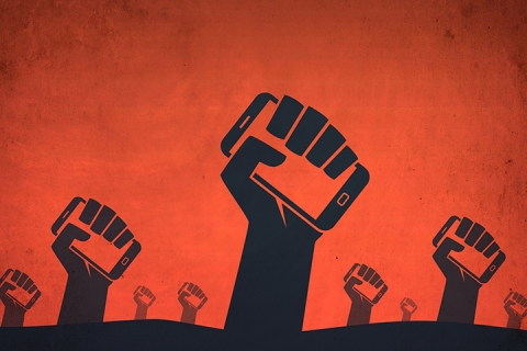 revolution and hands holding smartphones