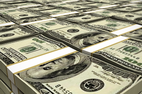 huge stacks of dollar bills