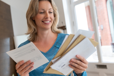 woman checking her mail 
