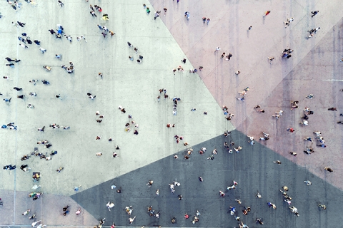 abstract image of people walking in an area of congrugation