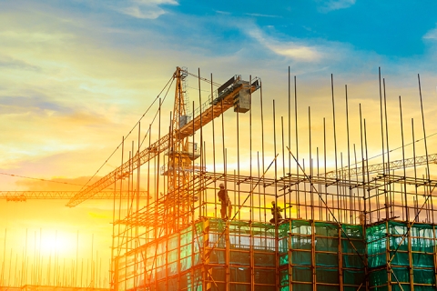 construction zone with sunrise sky in the background