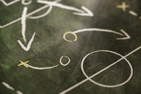 Shot of a basketball chart with arrows and moves