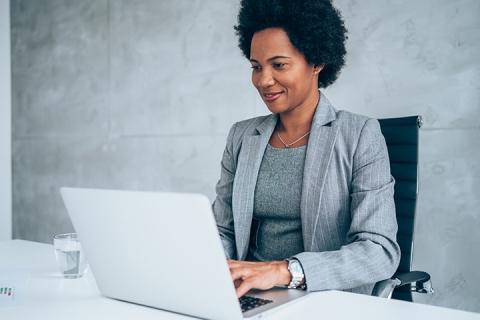 woman working at her computer