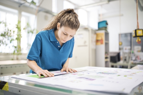 Woman measuring accurately to ensure her print is a success