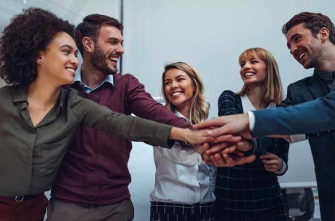 People in a team huddle