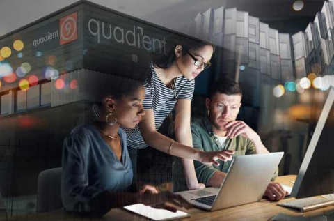 People looking at a laptop