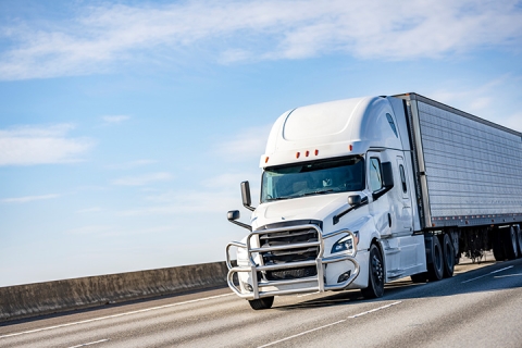 truck driving down highway