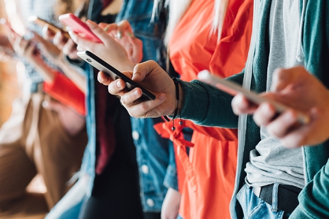 People holding smartphones. Modern devices. Technological progress.