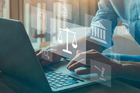 man searching legal information on laptop