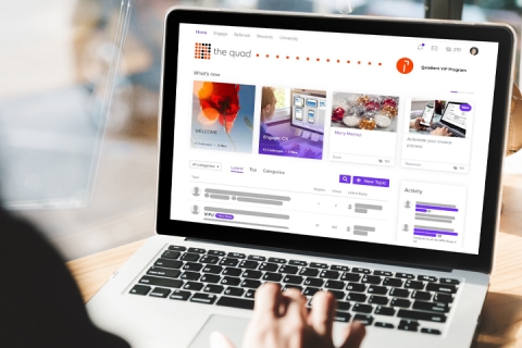 The Quad user community displayed on laptop screen