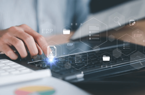 person typing on keyboard