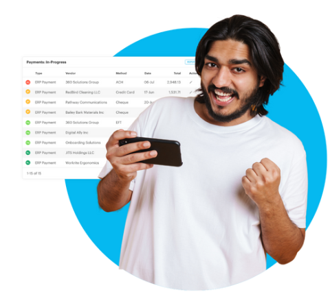 a guy with his phone and ap automation dashboard at the background