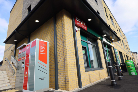 Image of a Parcel Pending By Quadient Parcel Locker outside a Morrison Daily store