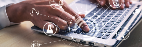 fingers typing on keyboard with connected icons