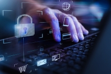 Closeup view of man`s hand using laptop with virtual digital screen with icon of lock on it.