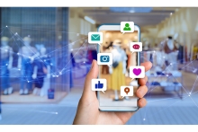 Digital social media icons in front of smartphone