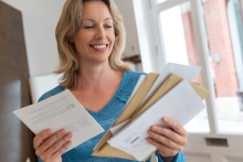woman checking her mail 