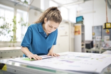 Woman measuring accurately to ensure her print is a success