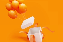 Présent avec des ballons orange et un fond orange