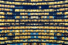 office workers working late in major office building