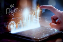 man reviewing communications performance metrics