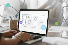 woman designing omnichannel communications on laptop